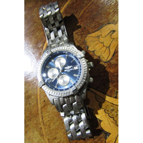 90 - Gentleman's Chronograph Wristwatch with Blue Tone Dial and Decorated Bezel on Interlinking Bracelet