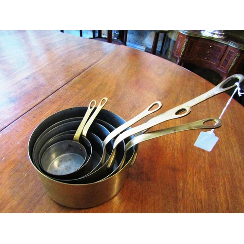 521 - Set of Six Graduated Chefs Turned Brass Saucepans with Cast Brass Handles