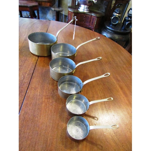 521 - Set of Six Graduated Chefs Turned Brass Saucepans with Cast Brass Handles