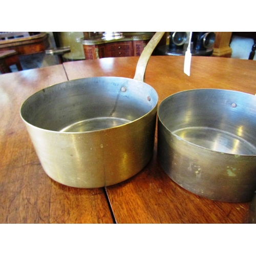 521 - Set of Six Graduated Chefs Turned Brass Saucepans with Cast Brass Handles