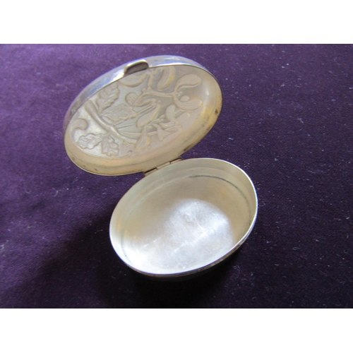 112 - Solid Silver Pill Box Oval Form Embossed Decoration to Hinged Cover Approximately 3 Inches Wide