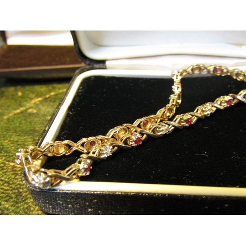 61 - 9 Carat Gold Diamond and Ruby Set Ladies Bracelet of Articulated Form Approximately Bracelet Length ... 