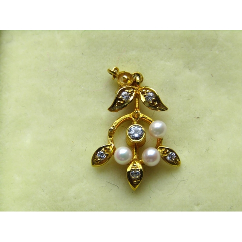 64 - 18 Carat Gold Diamond Decorated Ladies Pendant with Further Seed Pearl Decoration Floral Spray Motif