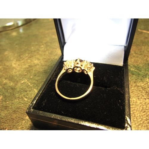 94 - 9 Carat Gold Three Stone Ladies Ring with Central Sapphire Mounted on 9 Carat Gold Band Ring Size L