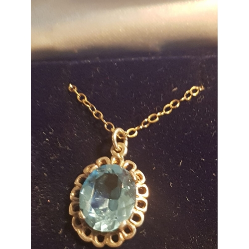 626 - Blue Topaz Pendant on 9 Carat Yellow Gold Chain Approximately 18 Inches Long