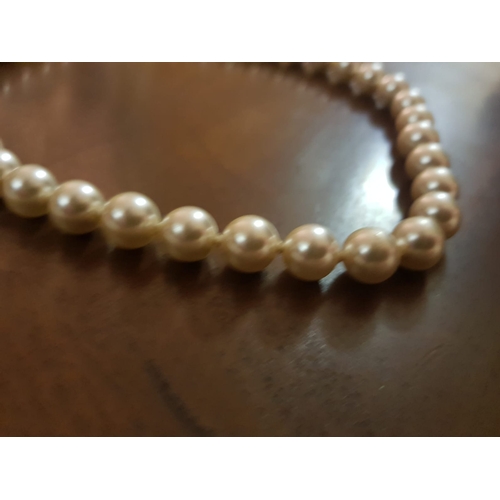 628 - White Pearl Necklace of Good Hue Approximately 18 Inches Long