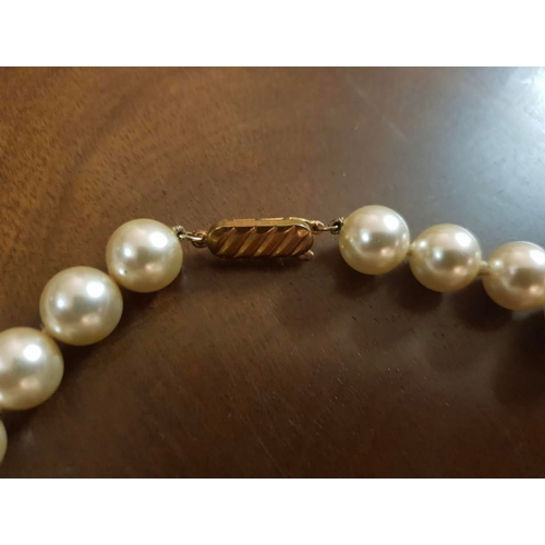 628 - White Pearl Necklace of Good Hue Approximately 18 Inches Long