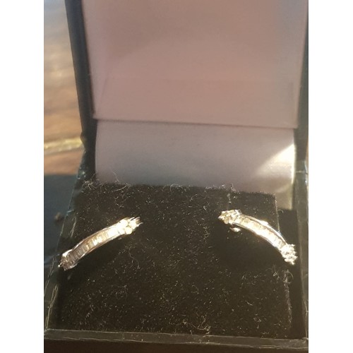 625 - Pair of 14 Carat White Gold Hoop Diamond Earrings contained within Presentation Box