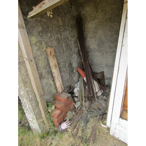 1010 - Collection of Old Red Bricks Garden Stakes etc Quantity As Photographed inside Shed