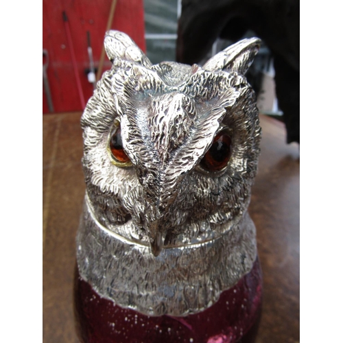 1034 - Silver Mounted Owl Motif Decanter with Cranberry Glass Well. Damaged Approximately 9 Inches High