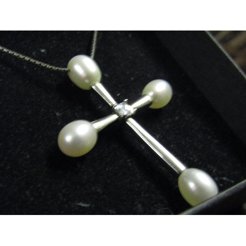 1040 - Sold Silver Pearl Decorated Crucifix on Silver Chain with Diamond Inset to Cross