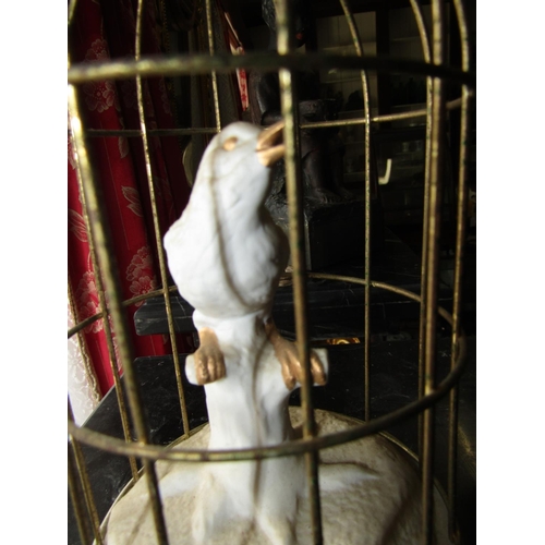 1066 - Fine Parianware Porcelain Figure of Bird contained within Gilded Cage Musical Mechanism to Base Appr... 