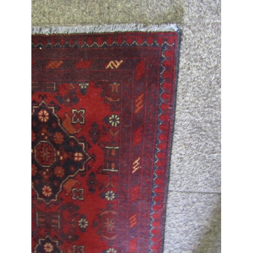 1084 - Persian Pure Wool Rug Dark Burgundy Ground Approximately 4ft 6 Inches Long x 3ft Wide