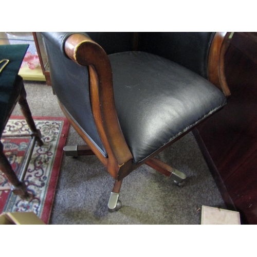 1090 - Figured Mahogany Office Armchair of Good Construction and Generous Size Swivel Base