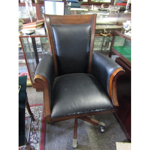 1090 - Figured Mahogany Office Armchair of Good Construction and Generous Size Swivel Base