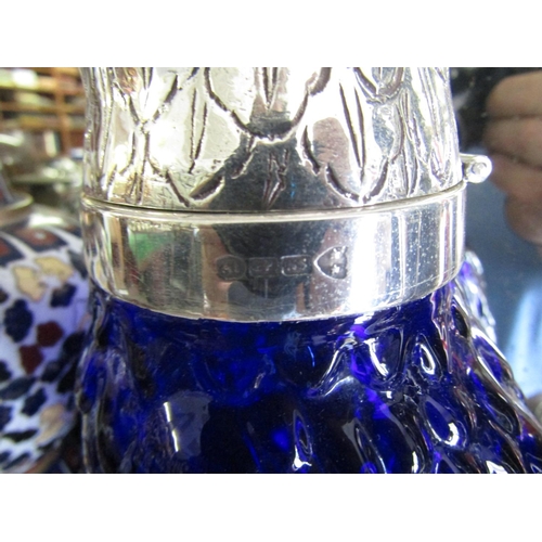 1122 - Silver Plate Mounted Parrot Motif Decanter with Blue Bristol Glass Base Approximately 9 Inches High ... 