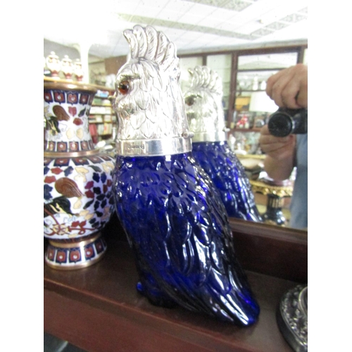 1122 - Silver Plate Mounted Parrot Motif Decanter with Blue Bristol Glass Base Approximately 9 Inches High ... 