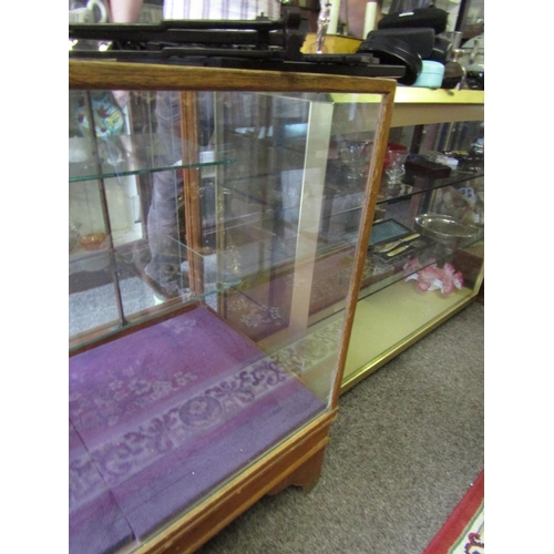 1196 - Antique Mahogany Bound Glazed Shop Counter Approximately 5ft Wide with Sliding Doors Verso