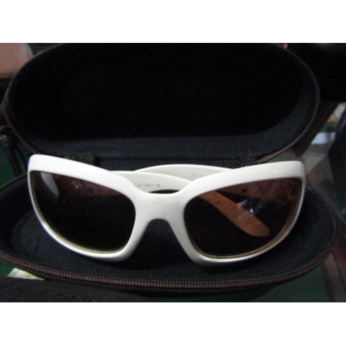 1204 - Four Pairs of Ladies Designer Sunglasses contained within Cases