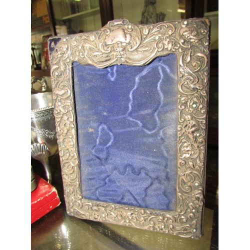 1227 - Antique Solid Silver Photograph Frame with Embossed Decoration Approximately 9 Inches High x 5 Inche... 