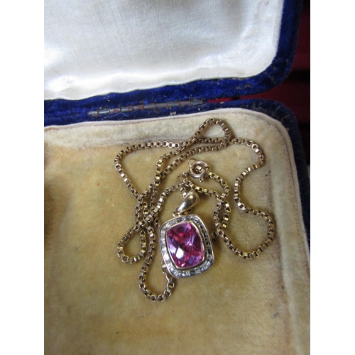 125 - 9 Carat Gold Ladies Pendant Necklace with Diamond Surround and Centrestone Possibly Pink Sapphire