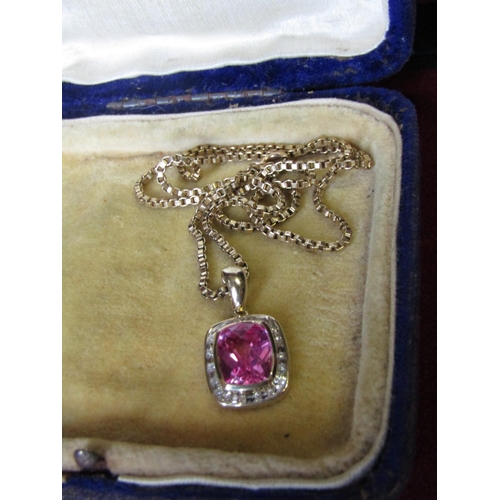 125 - 9 Carat Gold Ladies Pendant Necklace with Diamond Surround and Centrestone Possibly Pink Sapphire