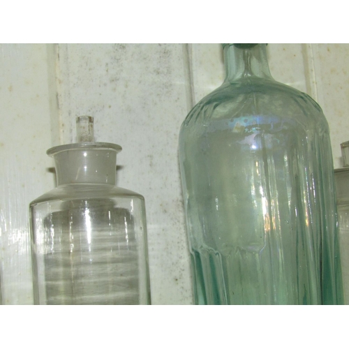 1283 - Two Shelves of Old Chemist Bottles with Stoppers Quantity As Photographed