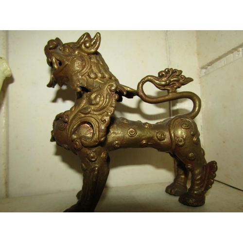 1302 - Eastern Bronze Sculpture of Lion Approximately 8 Inches High