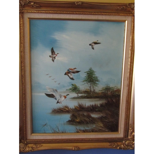 1356 - Pair of Gilt Framed Oil on Canvas Paintings Depicting Ducks in Flight Each Signed Approximately 24 I... 