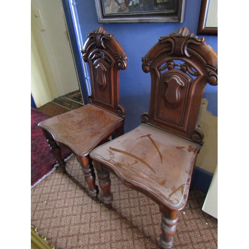 1377 - Pair of Victorian Carved Hall Chairs with Serpentine Front Rails above Turned Supports