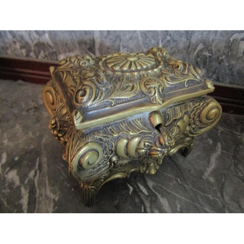 139 - Shaped Form Ormolu Jewellery Box with Hinged Top above Shaped Supports Approximately 8 Inches Wide