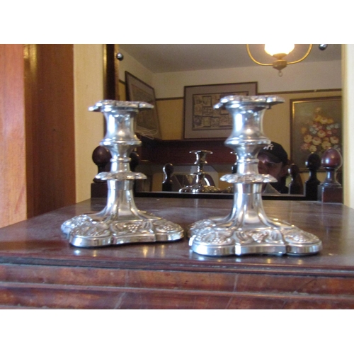 1410 - Pair of Antique Silver Plated Candle Sticks with Embossed Decoration Each Approximately 5 Inches Hig... 