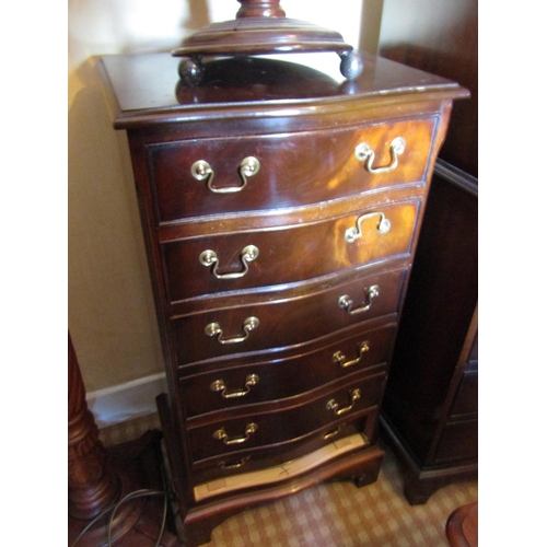 1428 - Figured Mahogany Serpentine Tall Chest of Six Drawers above Bracket Supports Approximately 20 Inches... 