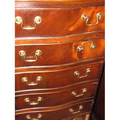 1428 - Figured Mahogany Serpentine Tall Chest of Six Drawers above Bracket Supports Approximately 20 Inches... 