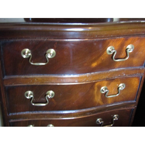 1428 - Figured Mahogany Serpentine Tall Chest of Six Drawers above Bracket Supports Approximately 20 Inches... 