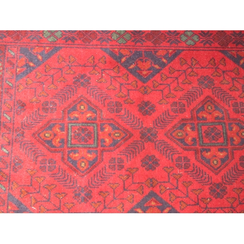 1455 - Persian Pure Wool Rug of Burgundy Ground Approximately 4ft 6 Inches Long x 3ft 6 Inches Wide