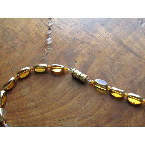 1547 - 9 Carat Gold Clasp Amber Necklace of Graduated Form Attractive Colour