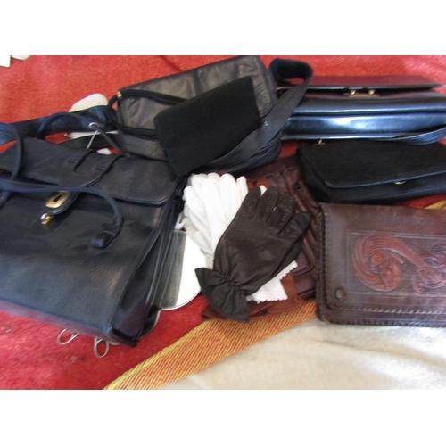 1554 - Collection of Various Leather Handbags and Gloves etc on Bed Quantity As Photographed