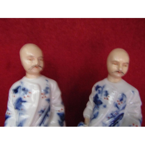 1672 - Pair of Porcelain Figures Each Approximately 10 Inches High