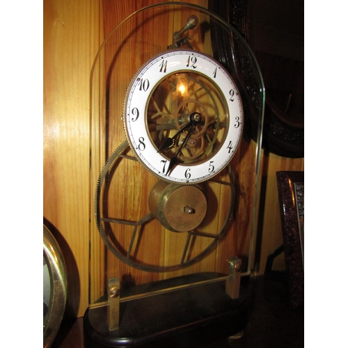 1689 - Dome Crystal Front Plate Decorated Skeletal Form Clock Complete with Pendulum and Key Approximately ... 