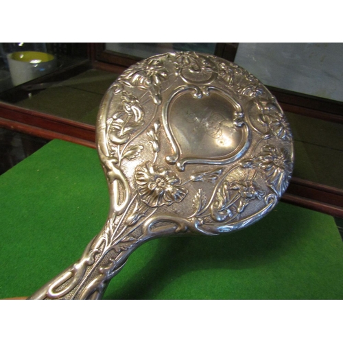 191 - Antique Solid Silver Mounted Ladies Hand Mirror with Embossed Decoration Approximately 11 Inches Hig... 