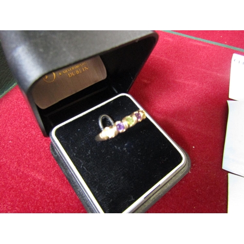 263 - Amethyst and Peridot Ladies Line Ring Mounted on 9 Carat Gold Ring Size N