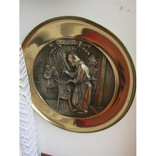 294 - Set of Four Heavy Brass Wall Chargers Depicting Trades People Each Approximately 13 Inches Diameter