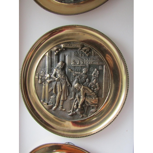 295 - Set of Four Heavy Brass Wall Chargers Depicting Trades People Each Approximately 13 Inches Diameter