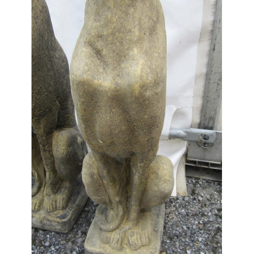 311 - Pair of Composite Stone Seated Hounds Each Approximately 32 Inches High