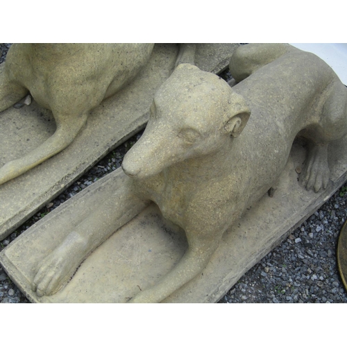 313 - Pair of Composite Stone Recumbent Hounds Each Approximately 32 Inches Wide