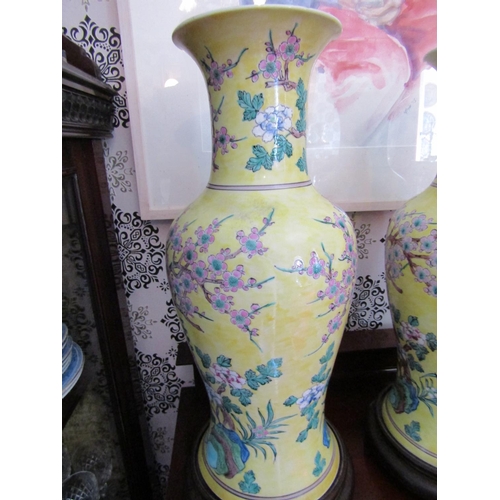 319 - Pair of Yellow Ground Oriental Vases with Floral Motif Decoration Each Approximately 20 Inches High