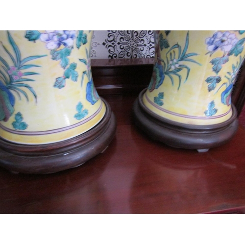 319 - Pair of Yellow Ground Oriental Vases with Floral Motif Decoration Each Approximately 20 Inches High