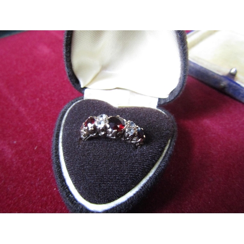 405 - 9 Carat Gold Ladies Ring Mounted with Three Red Garnets and Diamonds