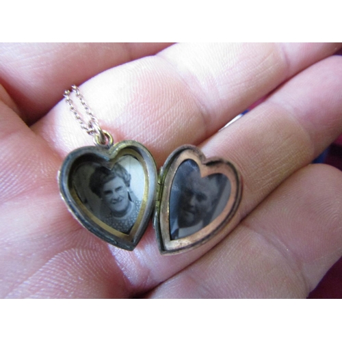 410 - Heart Form Locket with Hinged Cover on 9 Carat Gold Chain